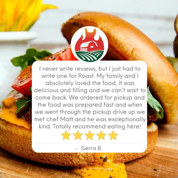 A Roast burger with melted cheese, lettuce, and tomato, overlaid with a customer review.